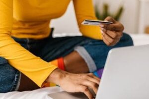 close-up-woman-hands-using-credit-card-to-buy-royalty-free-image-1687816356