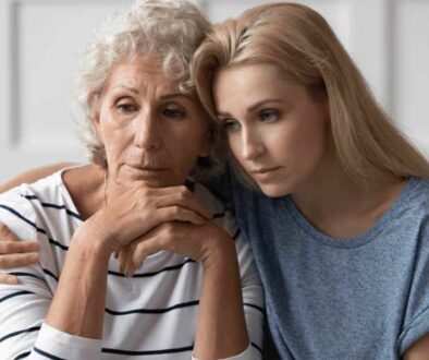 younger-woman-comforting-older-woman