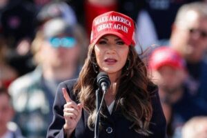 Governor_Kristi_Noem_w_Maga_hat_speaks