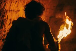 primeval-caveman-wearing-animal-skin-exploring-cave-royalty-free-image-1733261635