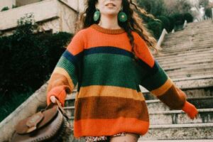 free-photo-of-stylish-woman-in-colorful-sweater-on-urban-steps