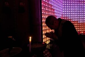 01-monk-at-temple-prays-500x334-1
