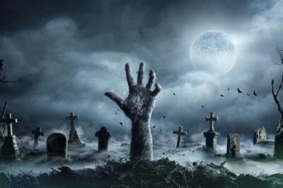 undead-zombie-hand-rising-out-of-a-grave-m