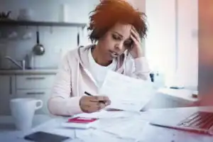 Woman-paying-bills-1200x800.jpg