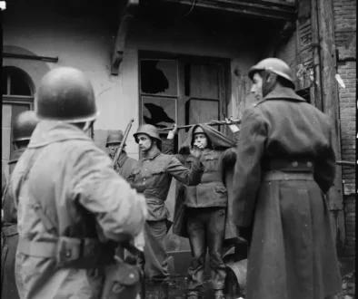 german-soldiers-surrender-to-the-french-1st-armored-v0-b9kpbyvpzt2g1
