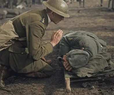 a-british-army-chaplain-saying-a-prayer-over-a-dying-german-v0-xhs8jzrocj8g1