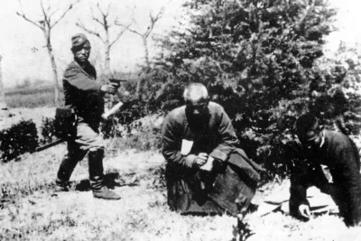 ajapanese-officer-prepares-to-shoot-a-buddhist-monk-and-a-v0-sk7uvxvd317g1