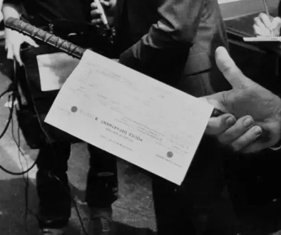 an-nypd-officer-holds-an-iron-rod-used-in-the-lynching-a-v0-3sknn2w897eg1