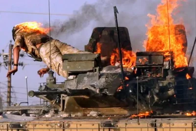private-karl-hinett-jumps-from-a-burning-tank-set-ablaze-in-v0-jjtvsijya2eg1