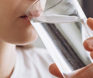 young-person-drinking-water-from-a-glass