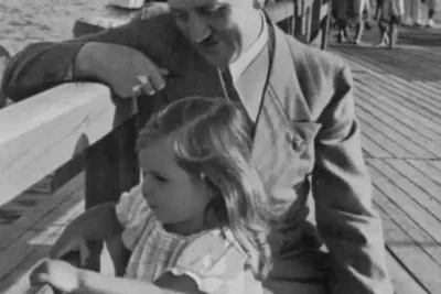 adolf-hitler-with-helga-goebbels-during-a-walk-on-v0-in4m9z18chhg1