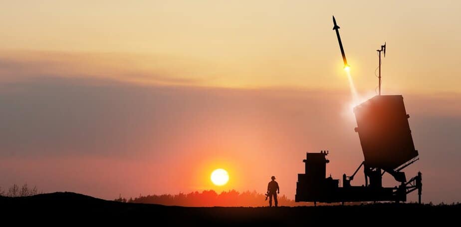 How do Israel and Iran’s nuclear status differ under international law?