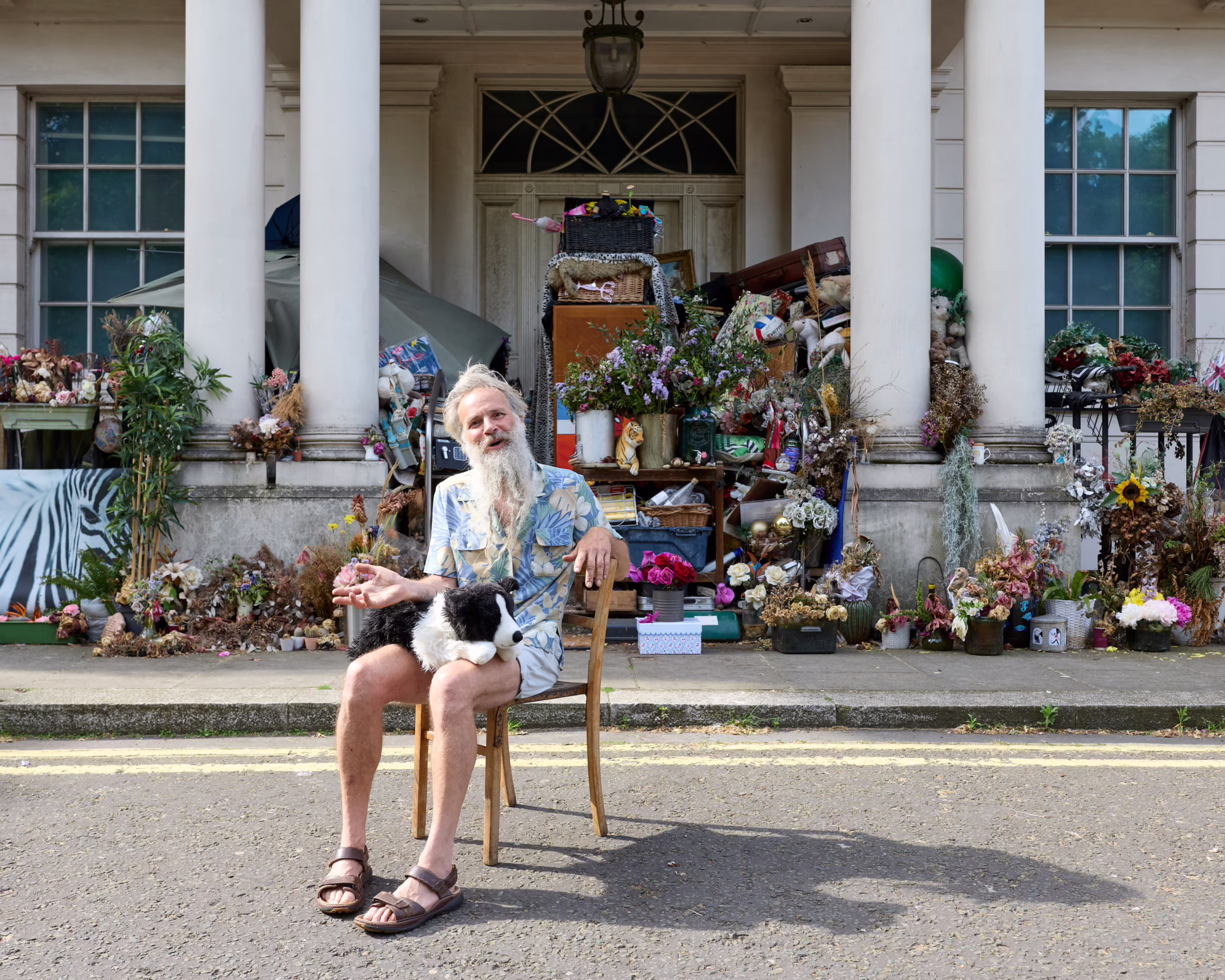 It was Britain’s most expensive house. Why is its only resident a homeless man who lives on the porch