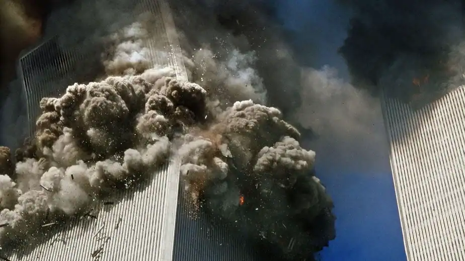 “I saw the tower was about to collapse. I took one photo. Then someone shouted, ‘Run!’” In shock, covered in dust, and bleeding, she captured some of the most memorable 9/11 photos